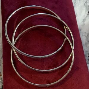 Interlocking 3 piece silver tone bangles